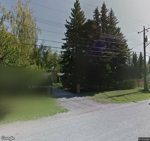 Street view of 7124 Bow Crescent NW, Calgary