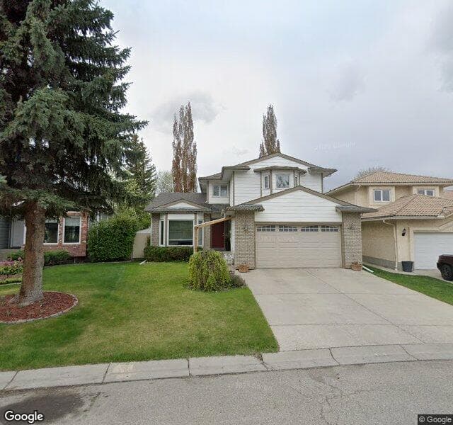 Street view of 76 Sunrise Crescent SE, Calgary