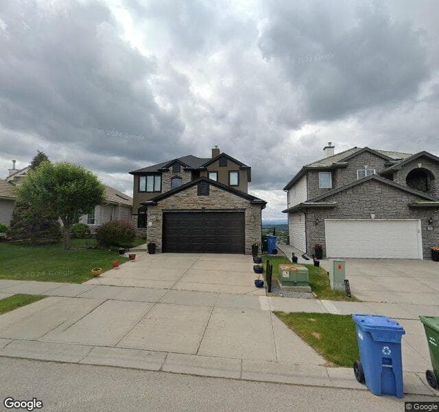 Street view of 347 Rocky Ridge Drive NW, Calgary