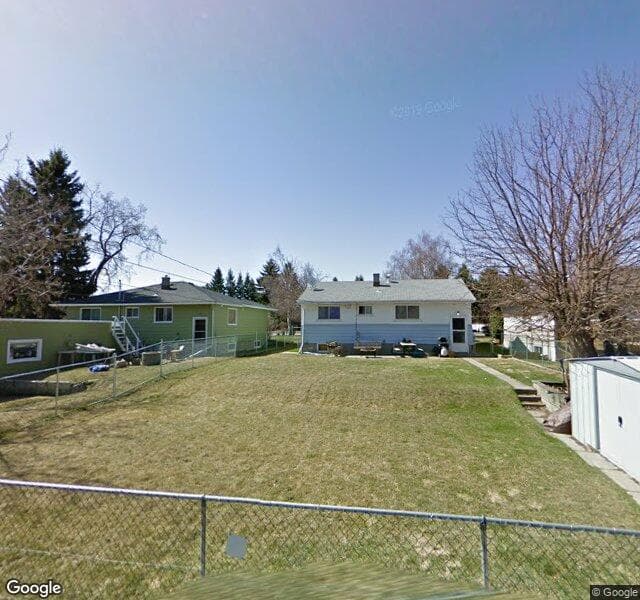 Street view of 3036 Exshaw Road NW, Calgary