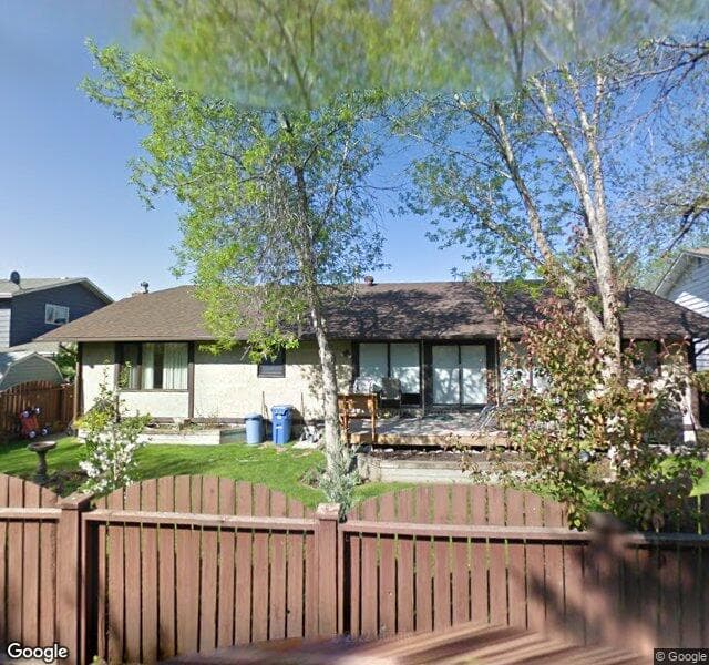 Street view of 612 Lake Simcoe Close SE, Calgary