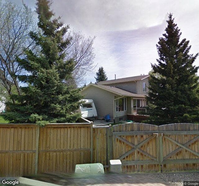Street view of 56 Woodbrook Place SW, Calgary