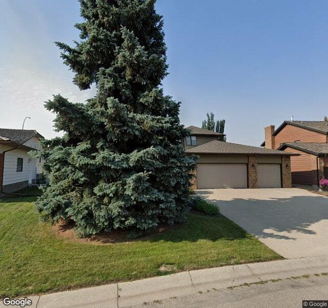 Street view of 308 Canterville Drive SW, Calgary