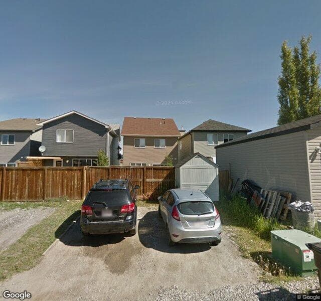 Street view of 1701 New Brighton Drive SE, Calgary