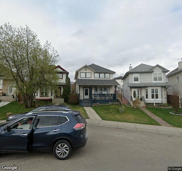 Street view of 105 Hidden Ranch Hill NW, Calgary