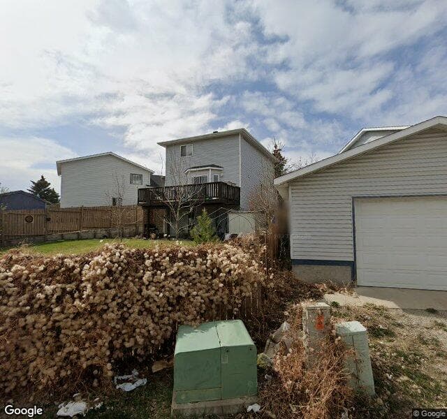 Street view of 64 Covington Mews NE, Calgary