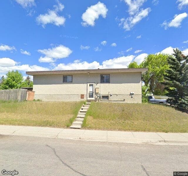 Street view of 6601 Huntridge Hill NE, Calgary