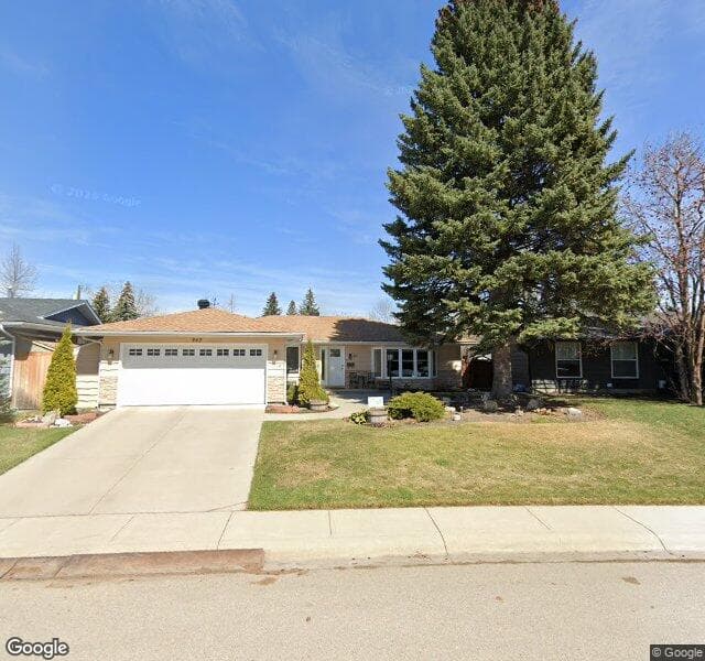 Street view of 843 Lake Twintree Crescent SE, Calgary