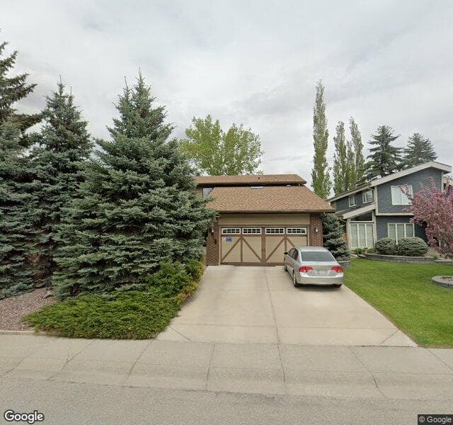 Street view of 2316 Deer Side Drive SE, Calgary