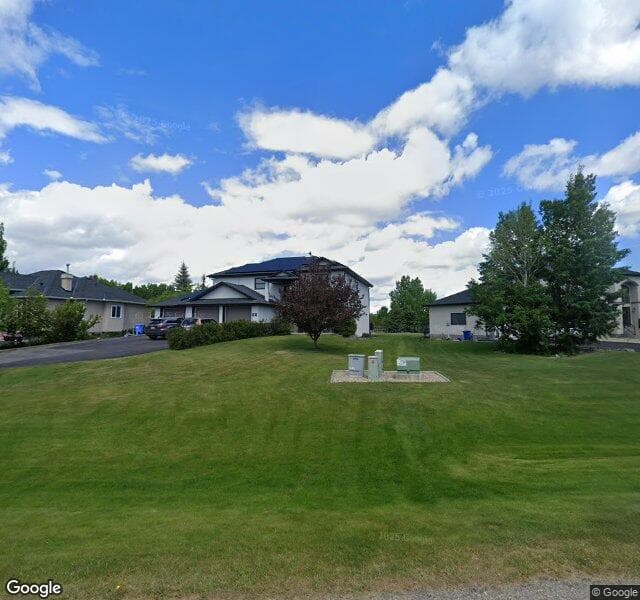 Street view of 64 Bearspaw Meadows Way NW, Calgary
