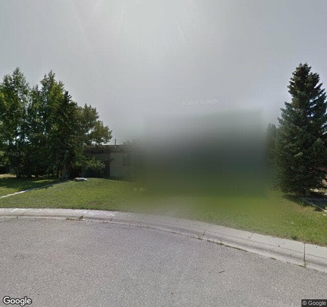 Street view of 82 Queen Isabella Close SE, Calgary