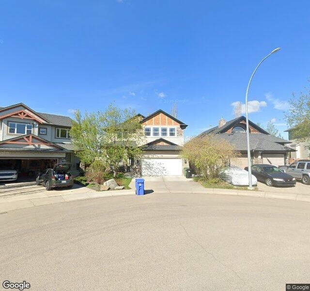 Street view of 94 Rockborough Park NW, Calgary