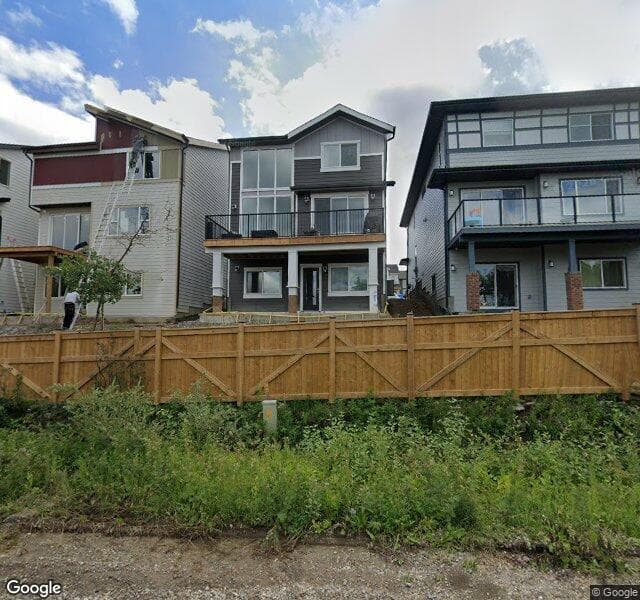 Street view of 84 Versant Point SW, Calgary