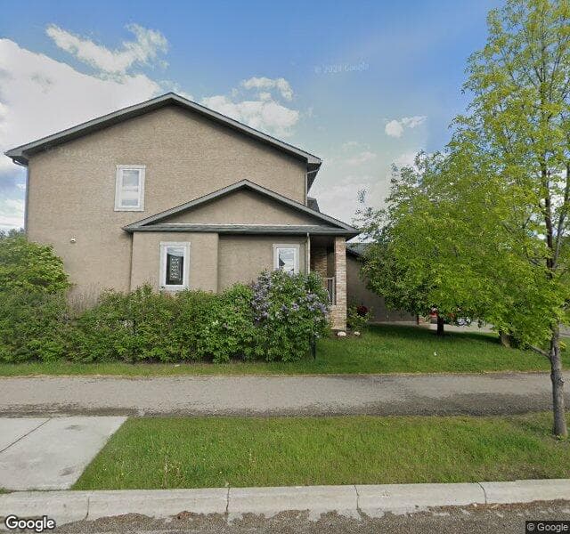 Street view of 9 Springborough Green SW, Calgary