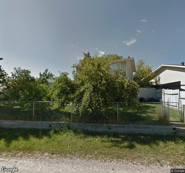 Street view of 320 Queen Anne Way SE, Calgary