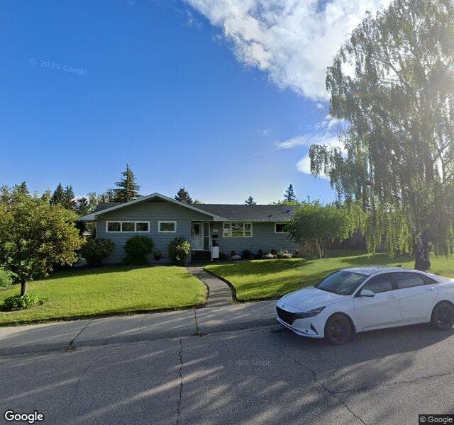 Street view of 4716 Grove Hill Road SW, Calgary