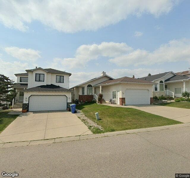Street view of 68 Arbour Wood Close NW, Calgary