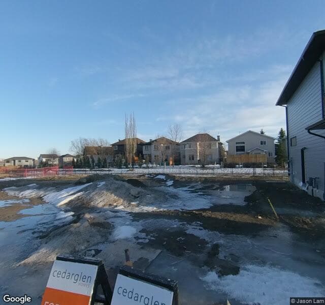 Street view of 65 Harvest Hills Manor NE, Calgary