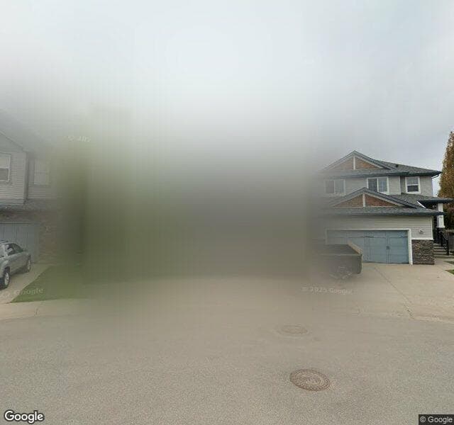 Street view of 58 Silverado Skies Crescent SW, Calgary