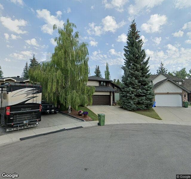 Street view of 32 Woodacres Place SW, Calgary