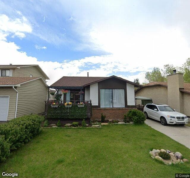 Street view of 8 Shawcliffe Place SW, Calgary
