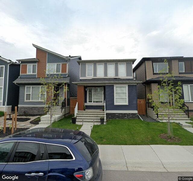 Street view of 107 Wolf Creek Manor SE, Calgary