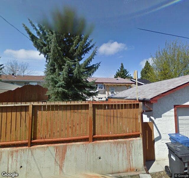 Street view of 10540 Oakmoor Way SW, Calgary