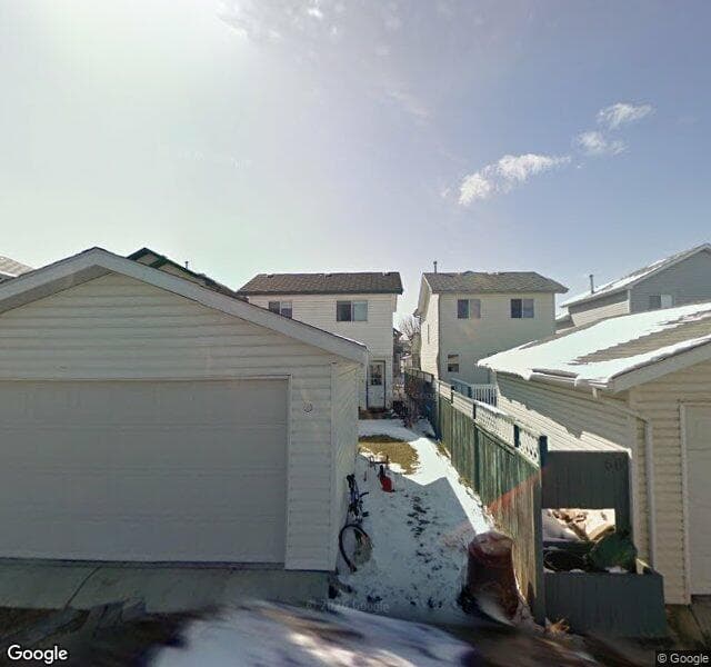 Street view of 62 Hidden Spring Green NW, Calgary