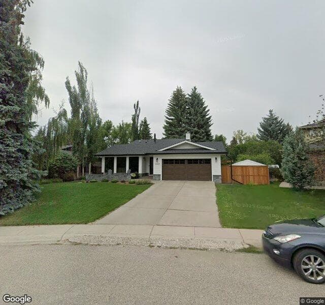 Street view of 2127 Lake Bonavista Drive SE, Calgary