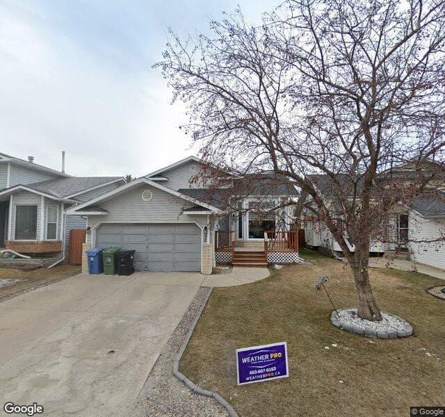 Street view of 20 Rivercroft Close SE, Calgary