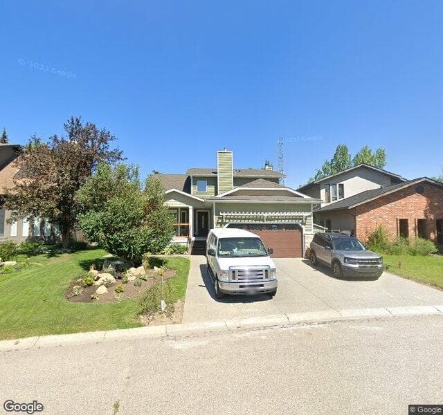 Street view of 76 Strathbury Circle SW, Calgary