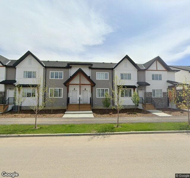 Street view of 20 Creekside Boulevard SW, Calgary