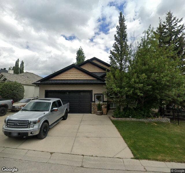 Street view of 106 Rocky Ridge Landing NW, Calgary