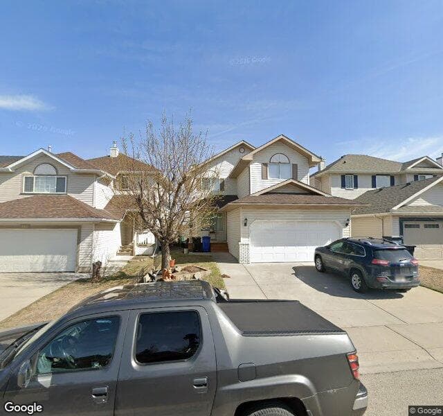 Street view of 180 Hidden Valley Manor NW, Calgary