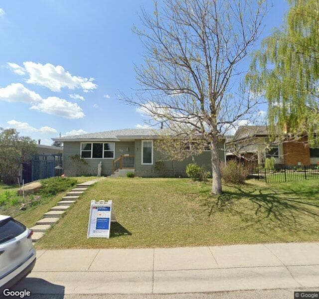 Street view of 67 Huntwick Way NE, Calgary