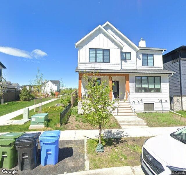 Street view of 85 Treeline Manor SW, Calgary