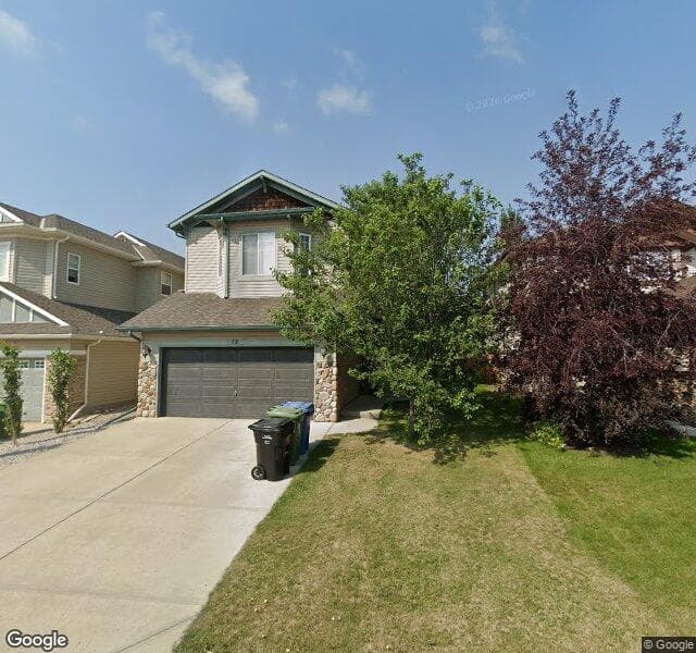 Street view of 58 Cougarstone Mews SW, Calgary