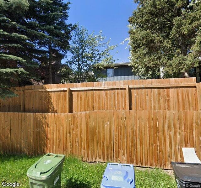 Street view of 812 Coach Side Crescent SW, Calgary