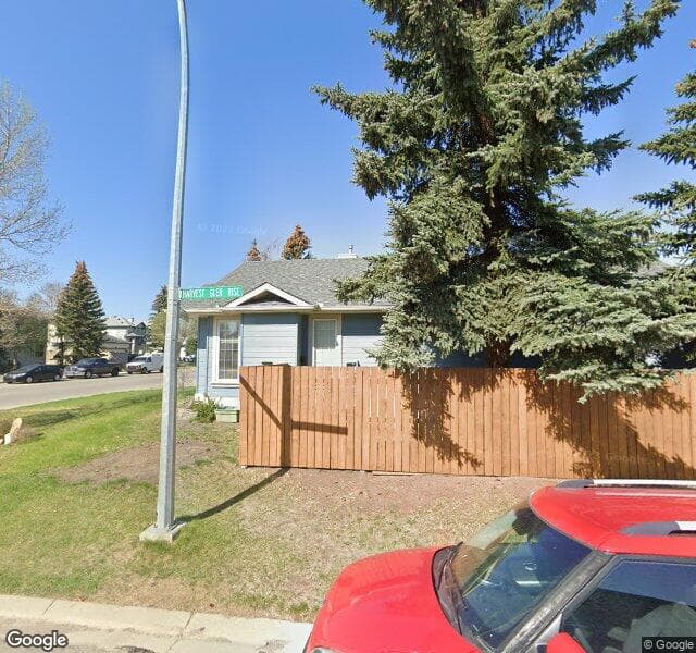 Street view of 899 Harvest Hills Drive NE, Calgary