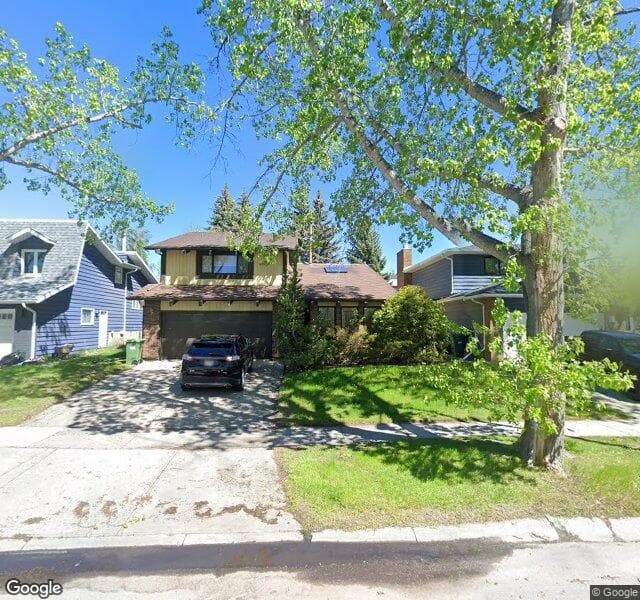 Street view of 32 Woodbine Boulevard SW, Calgary