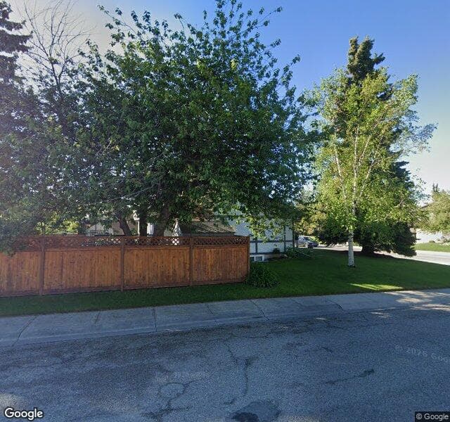 Street view of 2215 Lake Bonavista Drive SE, Calgary