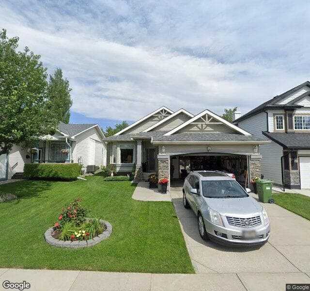 Street view of 13 Chaparral Way SE, Calgary