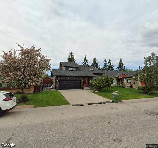 Street view of 619 Deercroft Way SE, Calgary
