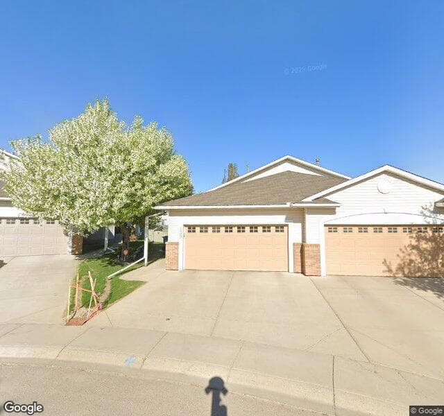 Street view of 159 Hidden Valley Green NW, Calgary