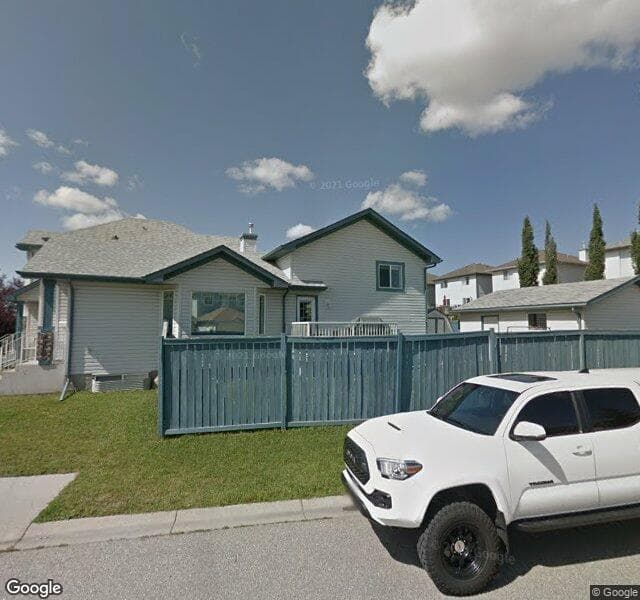 Street view of 945 Arbour Lake Road NW, Calgary