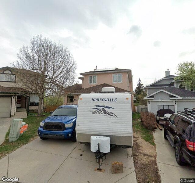 Street view of 111 Hidden Ranch Place NW, Calgary