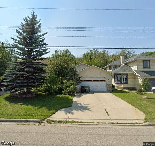 Street view of 8527 33 Avenue NW, Calgary