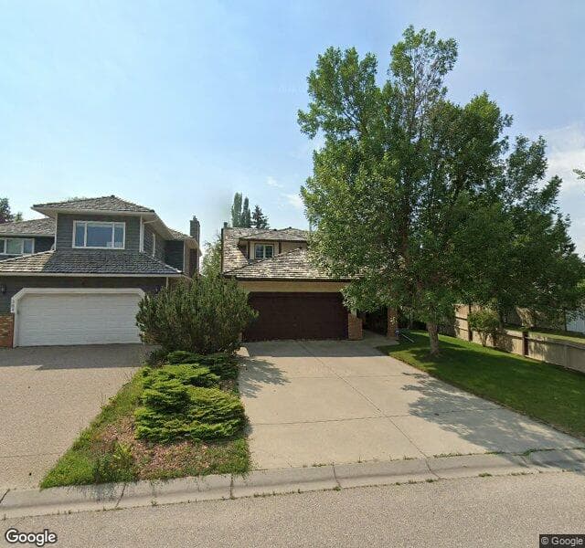 Street view of 380 Woodbriar Circle SW, Calgary