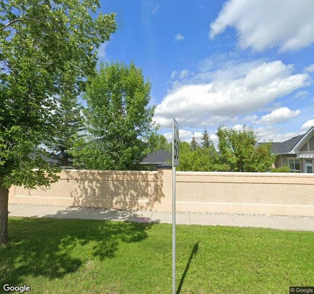 Street view of 86 Evercreek Bluffs Place SW, Calgary