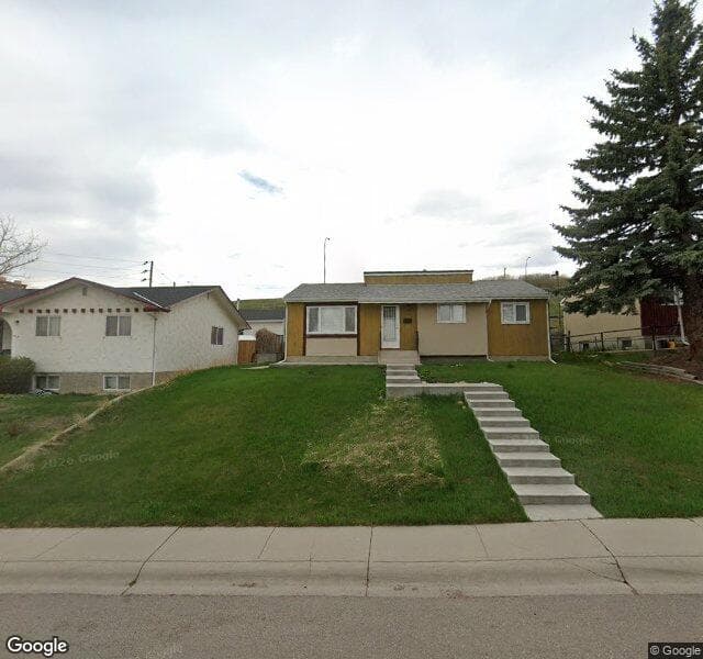 Street view of 7519 Hunterburn Hill NW, Calgary